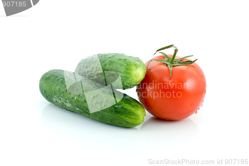 Image of Single tomato and pair of cucumbers