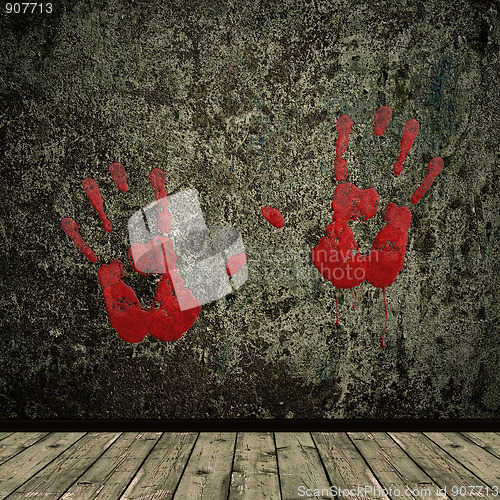 Image of grunge interior and hands print