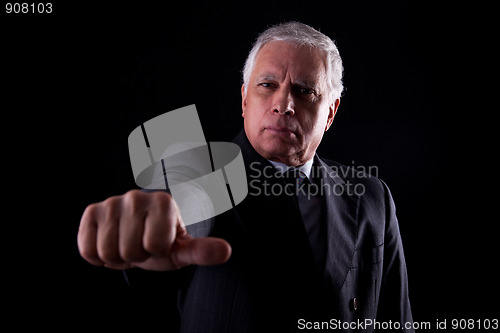 Image of old businessman with a hand with thumbs middle 