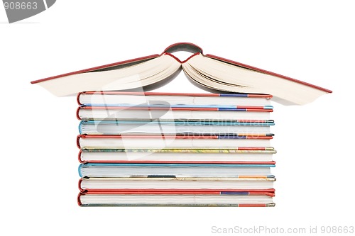 Image of color tower books arranged in house shape