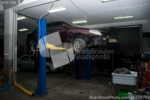 Image of car under repair