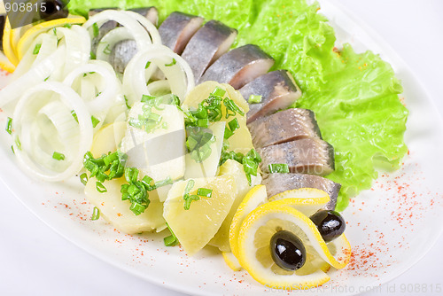Image of Herring with potato and vegetables