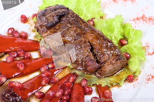 Image of beef steak with pomegranate