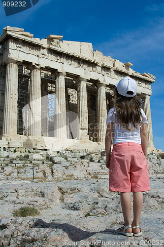 Image of Child in front of Ancient Parthenon in Acropolis Athens Greece
