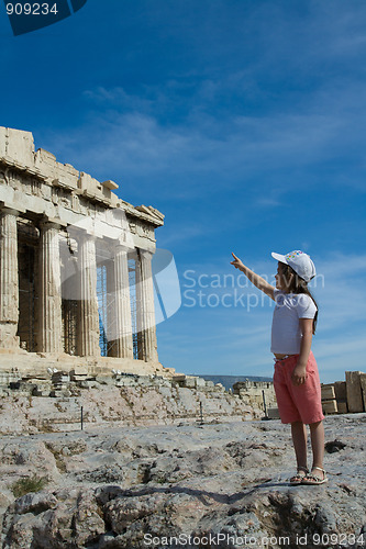 Image of Child points to  Ancient Parthenon Facade in Acropolis Athens Gr