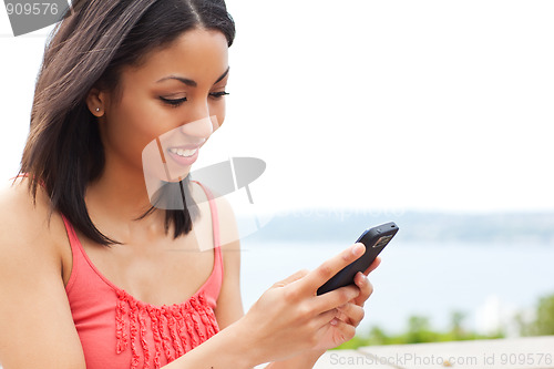 Image of Woman texting