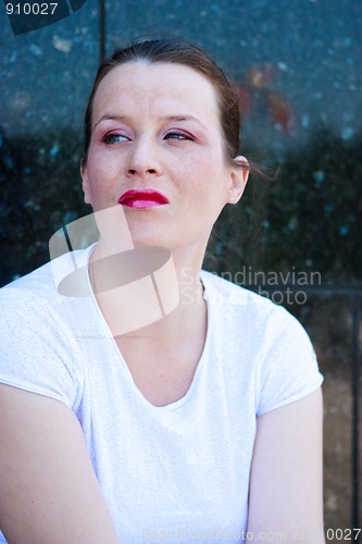 Image of Beautiful young girl over a black background