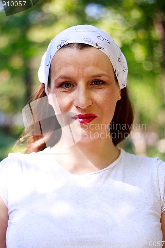 Image of Beautiful young girl with a bandana smiling