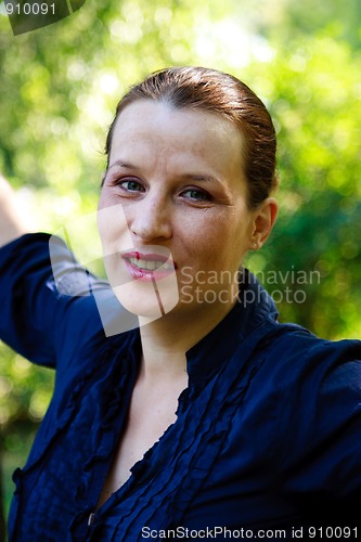 Image of Beautiful young woman smiling