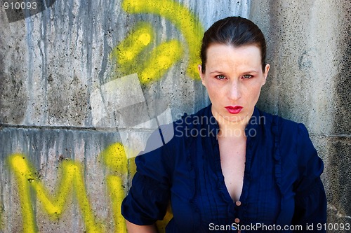 Image of Beautiful young woman with graffiti