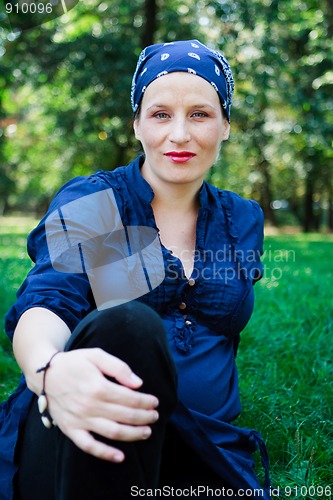 Image of Beautiful young woman in nature