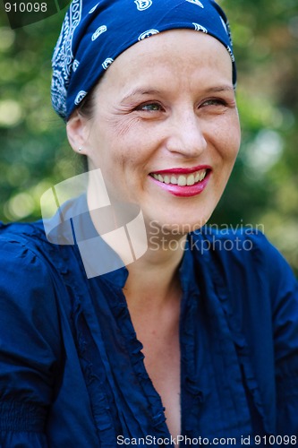 Image of Beautiful young woman laughing