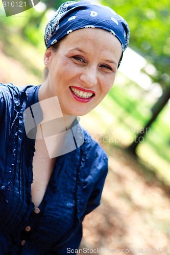 Image of Beautiful young woman laughing