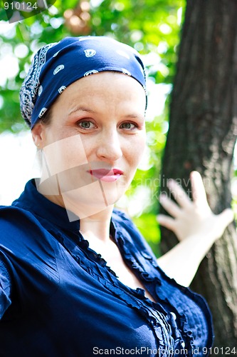 Image of Beautiful young woman in nature