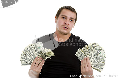 Image of sad man with lots of money