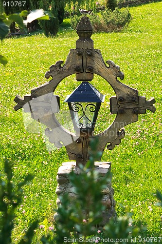 Image of Wooden cross and sparrow 