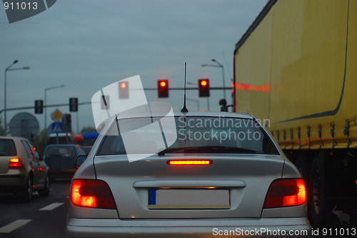 Image of a car going down the street