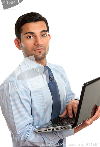 Image of Businessman with laptop computer