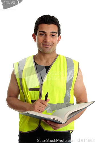 Image of Construction worker with pen and book