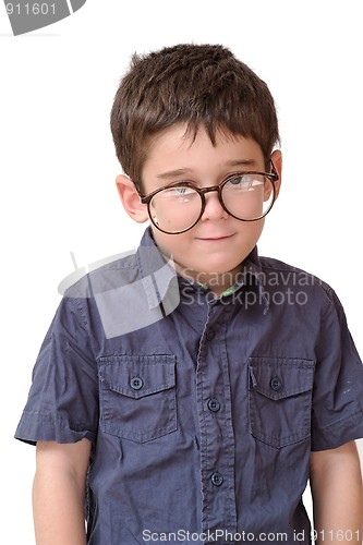 Image of Little boy in funny round spectacles stands isolated