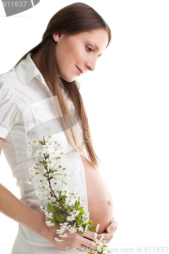 Image of Happy caring woman expecting baby