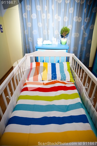 Image of nursery room and baby cot