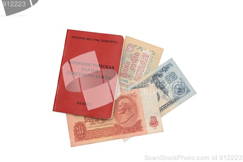 Image of Soviet communist party membership card with Soviet money inside it isolated