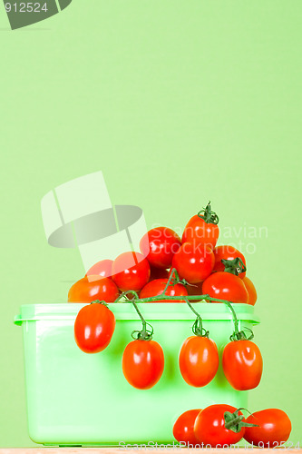 Image of container with fresh tomatoes