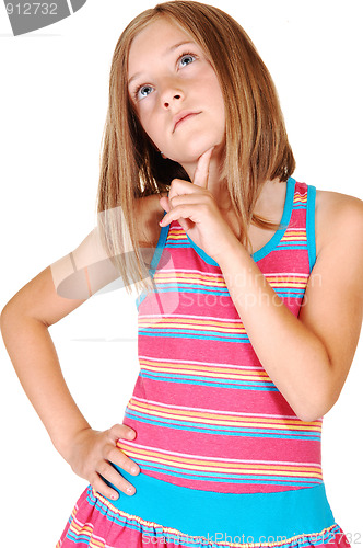 Image of Young girl thinking.