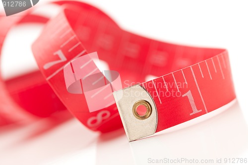 Image of Red Measuring Tape on White