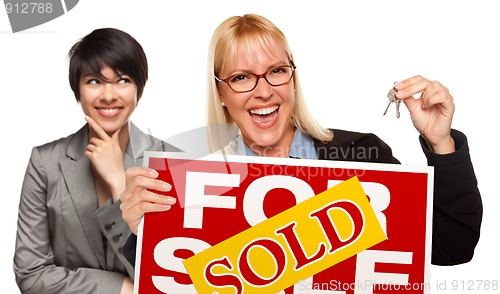 Image of Female with Blonde Woman Holding Keys and Sold For Sale Sign