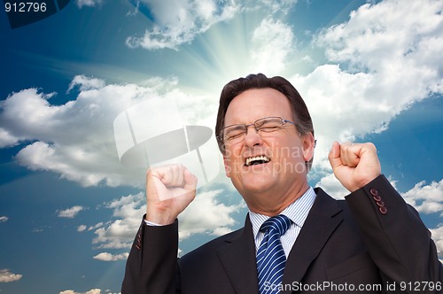 Image of Excited Businessman  Expresses His Excitement Outside