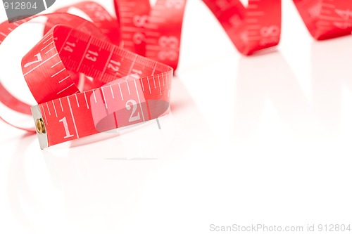 Image of Red Measuring Tape on White