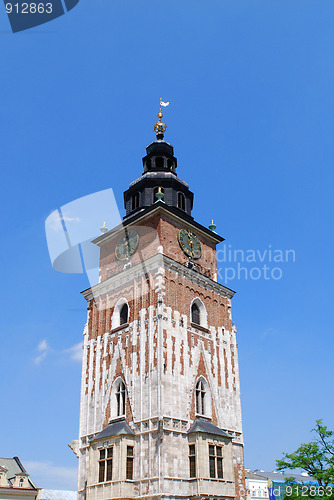 Image of Town hall with clock in summer Krakow