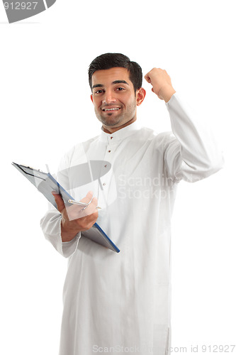 Image of Arab businessman victory success