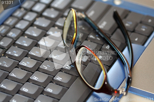 Image of Glasses on laptop