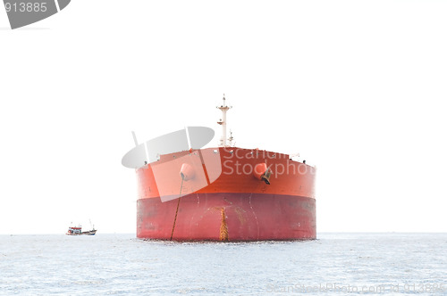 Image of High key photo of orange oil tanker.