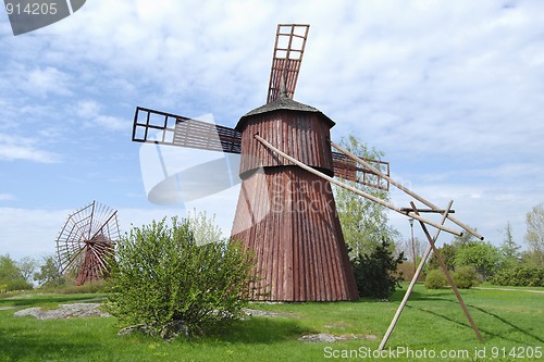 Image of Two Red Wooden Mills