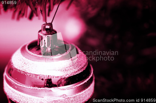 Image of Christmas ornaments on tree.