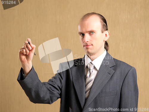 Image of Businessman writing something