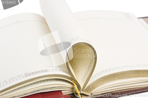 Image of detail of open blank notebook
