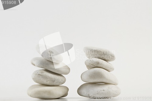 Image of two tower of white stones