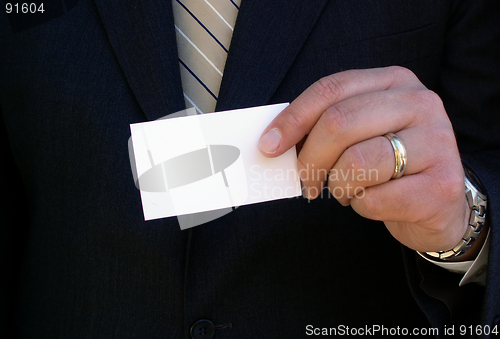 Image of holding a business card