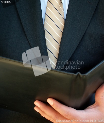 Image of businessman reading