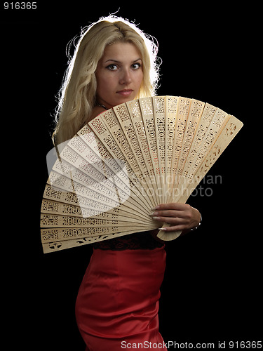 Image of Hot blonde in red dress with fan