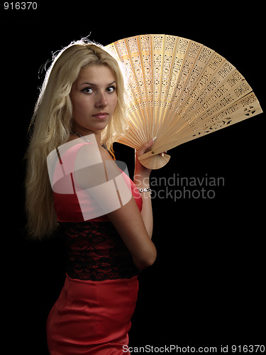 Image of Hot blonde in red dress with fan