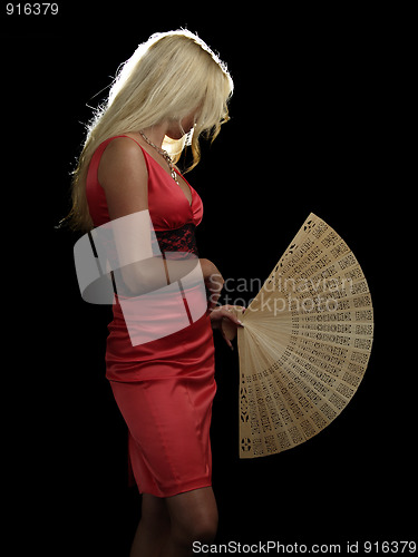 Image of Hot blonde in red dress with fan