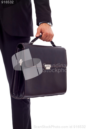 Image of  business man holding a suitcase 