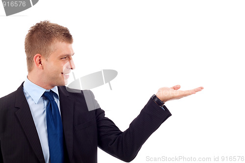Image of man in suit doing a presentation 