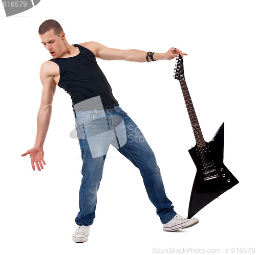 Image of holding guitar on foot